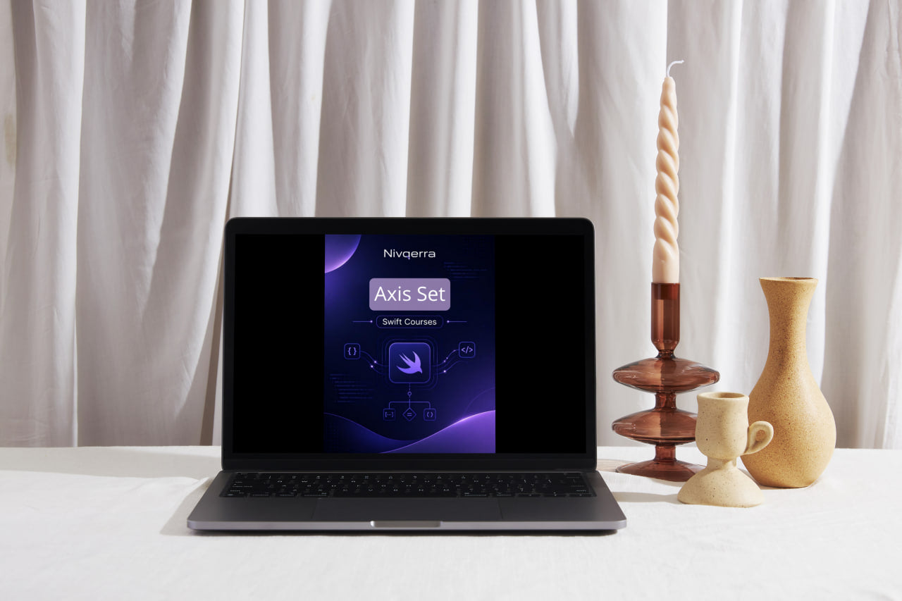 Laptop on a table with a white curtain background